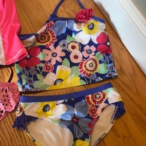 Lot of 2 girls bathing suits, 2 rash guard shirts.
